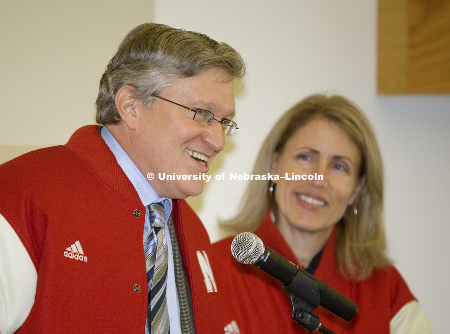Jeffrey S. Raikes and his wife, Tricia, speak at a noon luncheon honoring them. They were given the Husker letter jackets by athletic director Tom Osborne as a gift from the University of Nebraska Foundation. The luncheon was part of the dedication ceremonies for the  Jeffrey S. Raikes School of Computer Science and Management at the University of Nebraska–Lincoln.  Raikes, who was grew up in Ashland, Neb., is the CEO of the Bill and Melinda Gates Foundation and the former president of the Microsoft Business Division. Photo by Craig Chandler/University Communications/University of Nebraska–Lincoln