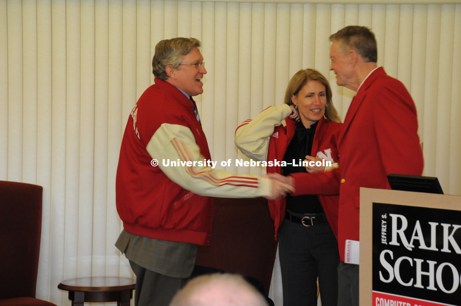 Jeffrey S. Raikes and his wife, Tricia, speak at a noon luncheon honoring them. They were given the Husker letter jackets by athletic director Tom Osborne as a gift from the University of Nebraska Foundation. The luncheon was part of the dedication ceremonies for the  Jeffrey S. Raikes School of Computer Science and Management at the University of Nebraska–Lincoln.  Raikes, who was grew up in Ashland, Neb., is the CEO of the Bill and Melinda Gates Foundation and the former president of the Microsoft Business Division. Photo by Greg Nathan, University Communications/University of Nebraska–Lincoln