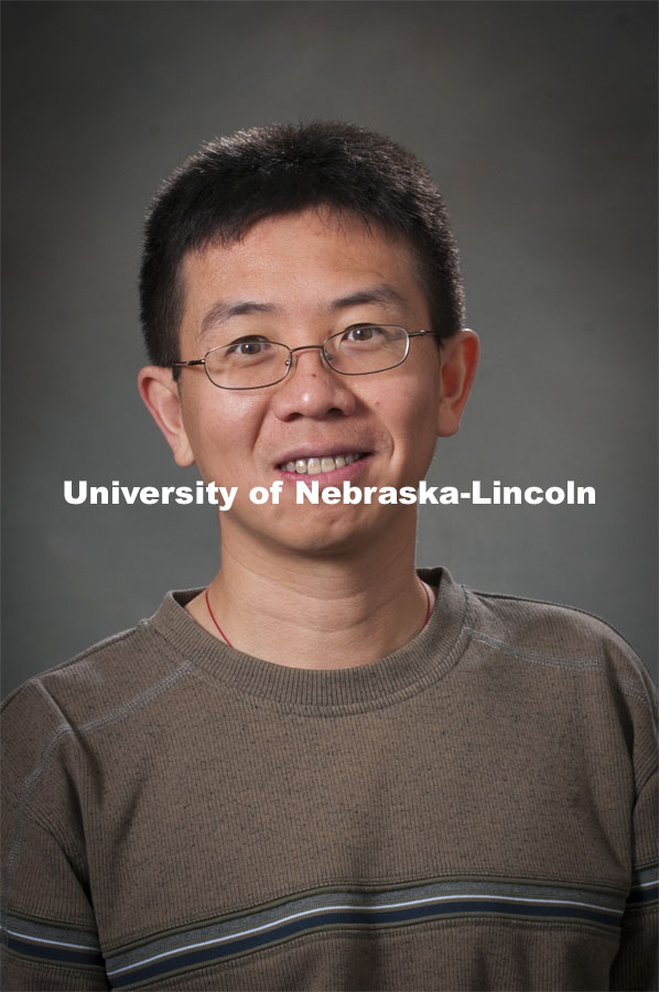 Pictured; Jiantao Guo, Assistant Professor, Chemistry. Academic Affairs, New Faculty Orientation, Studio Portrait. 100818, Photo by Greg Nathan, University Communications Photographer.