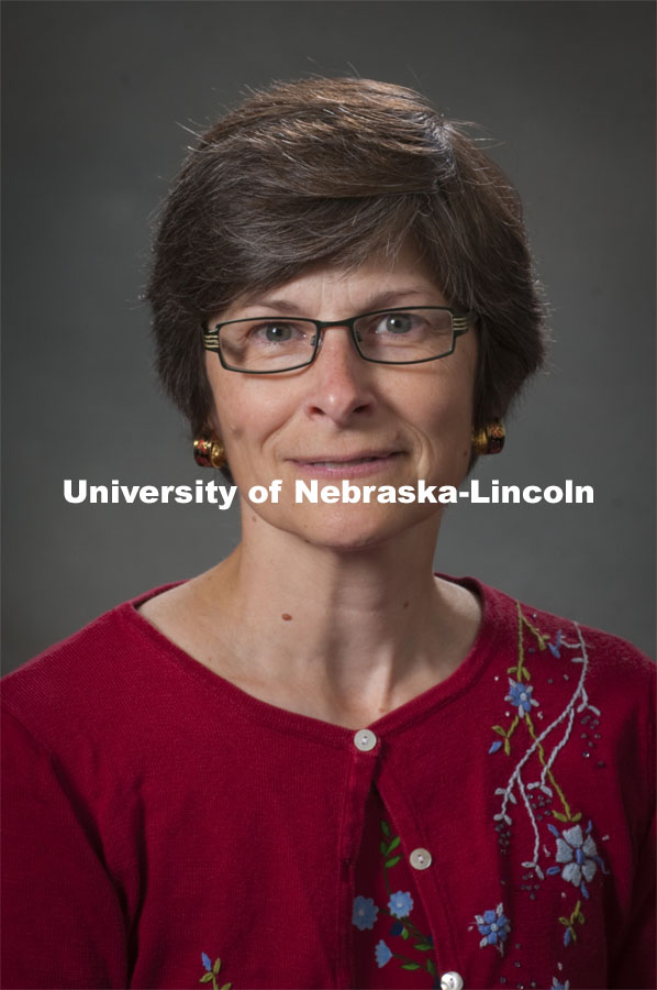 Pictured; Leslie Delserone, Science Librarian, University Libraries. Academic Affairs, New Faculty Orientation, Studio Portrait. 100818, Photo by Greg Nathan, University Communications Photographer.