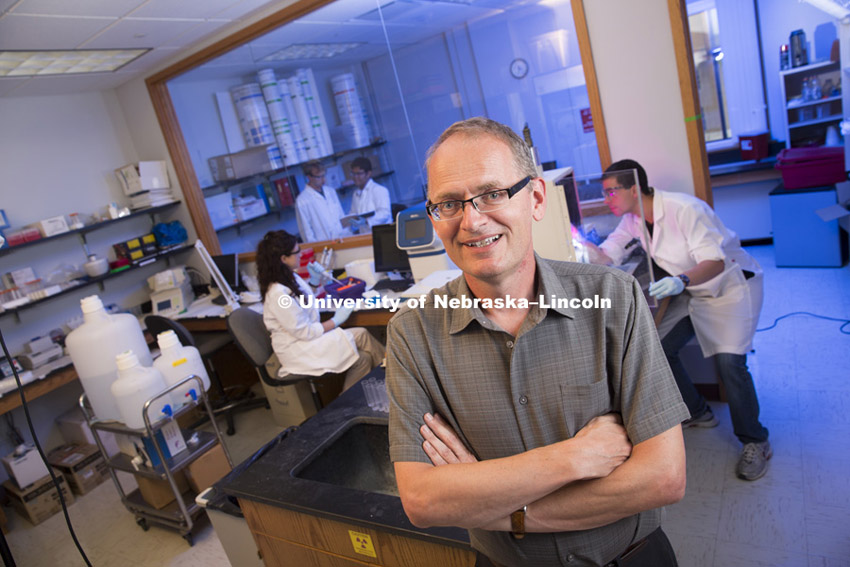 Janos Zempleni, Willa Cather professor of molecular nutrition, in his lab. August 8, 2014. Photo by Craig Chandler / University Communications