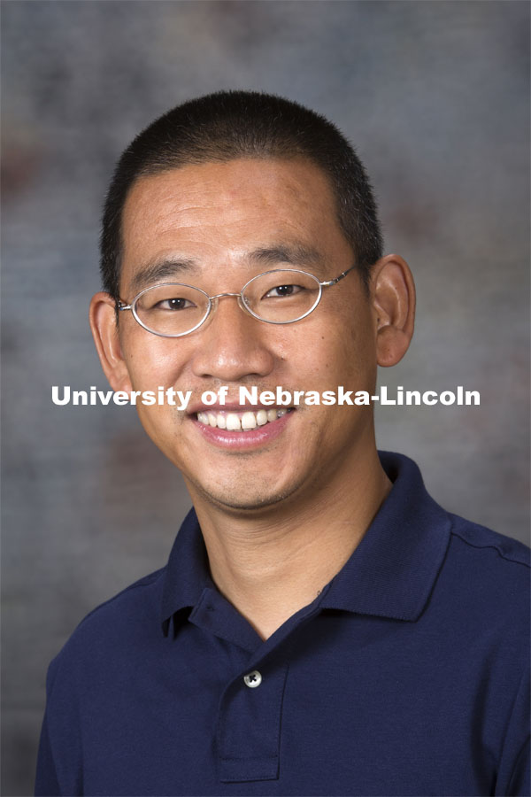 Studio portrait of Yuguo Lei, Assistant Professor, Chemical and Biomolecular Engineering. August 20, 2014. Photo by Craig Chandler, University Communications.
