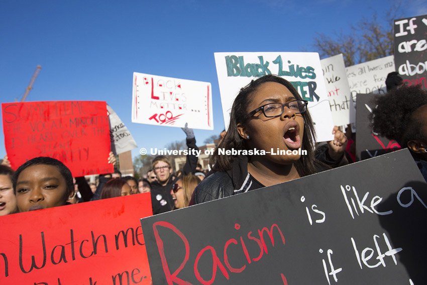 Kendall Dawson chants "Black Lives Matter" with the crowd at the end of the rally. Black Lives Matter rally filled the green space north of the Nebraska Union with several thousand students, faculty and staff Thursday. Ten students spoke on their thoughts and experiences. November 19, 2015. Photo by Craig Chandler / University Communications