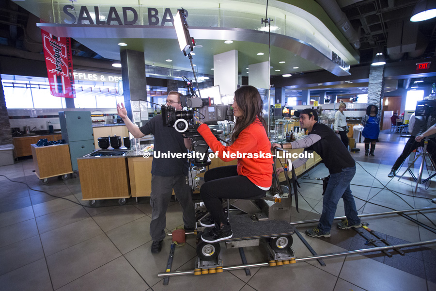 Amanda Christi, Academic Services and Enrollment Management (ASEM) Video Producer and Cinematographer, films a recruitment spot in Abel Sandoz Dining Hall. January 19, 2016. Photo by Craig Chandler / University Communication.