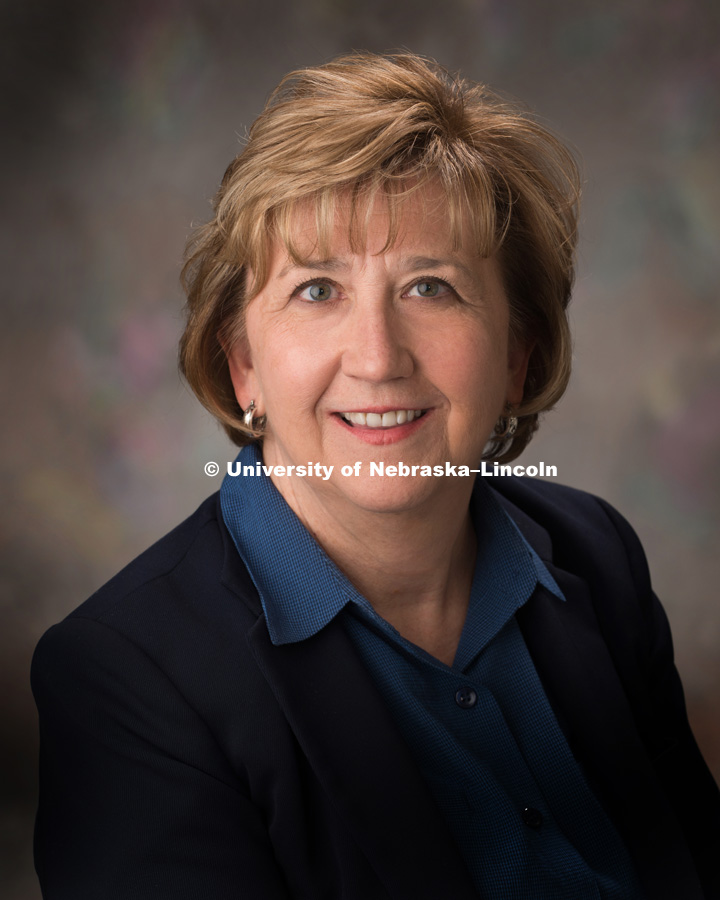 Studio portrait of Linda Schwartzkopf, director of Greek Affairs. April 8, 2016. Photo by Greg Nathan, University Communications Photographer.