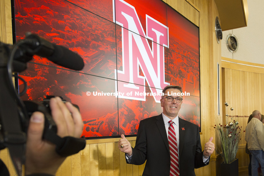 Ronnie Green gestures for the television cameras after being named the new UNL Chancellor Wednesday afternoon. April 6, 2016. Photo by Craig Chandler / University Communications