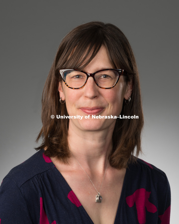 Studio portrait of Erica DeFrain, Library faculty/staff photo for web. May 4, 2016. Photo by Greg Nathan, University Communications Photographer.