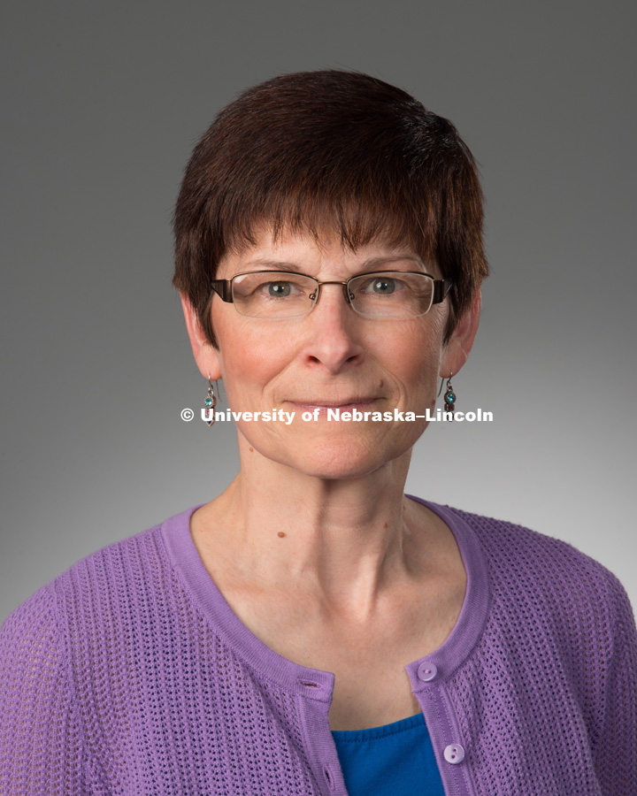 Studio portrait of Leslie Delserone, Library faculty/staff photo for web. May 4, 2016. Photo by Greg Nathan, University Communications Photographer.