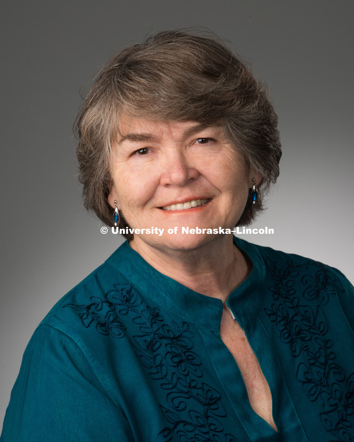 Studio portrait of Judith Wolfe, Library faculty/staff photo for web. May 4, 2016. Photo by Greg Nathan, University Communications Photographer.