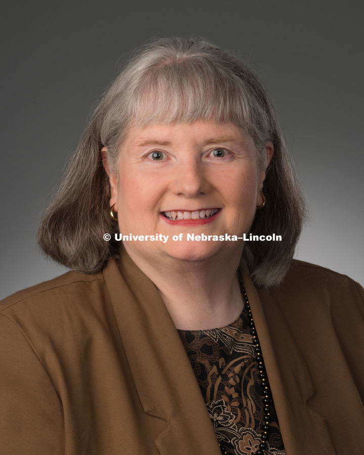 Studio portrait of Rebecca Bernthal, Library faculty/staff photo for web. May 4, 2016. Photo by Greg Nathan, University Communications Photographer.