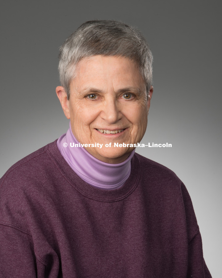 Studio portrait of Carole Goebes, Library faculty/staff photo for web. May 4, 2016. Photo by Greg Nathan, University Communications Photographer.