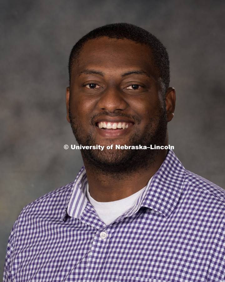 Studio portrait of Uchechukwu Jarrett, Assistant Professor, College of Business. New Faculty Orientation. August 29, 2016. Photo by Greg Nathan, University Communication Photography.