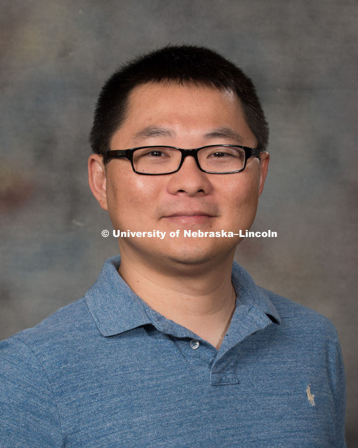 Studio portrait of Peng Peng, Assistant Professor, CEHS. New Faculty Orientation. August 29, 2016. Photo by Greg Nathan, University Communication Photography.