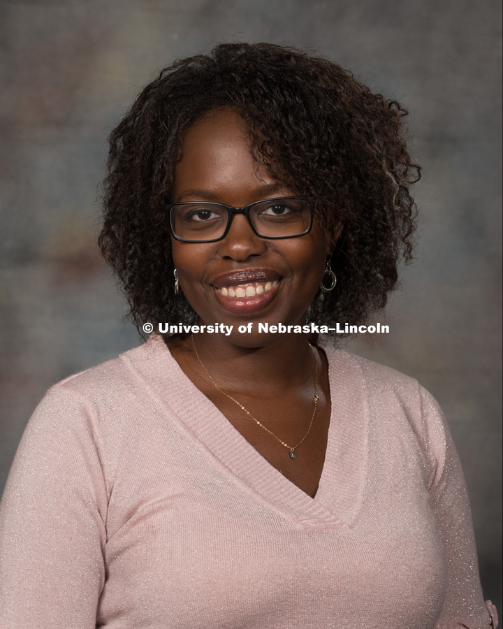 Studio portrait of Hope Wabuke, Assistant Professor, College of Arts and Science. New Faculty Orientation. August 29, 2016. Photo by Greg Nathan, University Communication Photography.