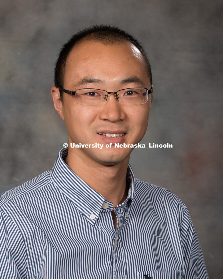 Studio portrait of Yuhang Xu, Assistant Professor, Statistics. New Faculty Orientation. August 29, 2016. Photo by Greg Nathan, University Communication Photography.