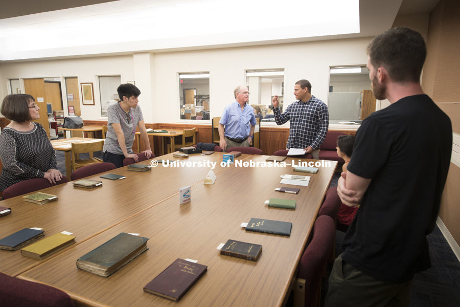 Kenneth Price, the Hillegass University Professor of American literature at Nebraska, shows part of the library's collection of Walt Whitman's work to his class.  August 23, 2016. Photo by Craig Chandler / University of Nebraska