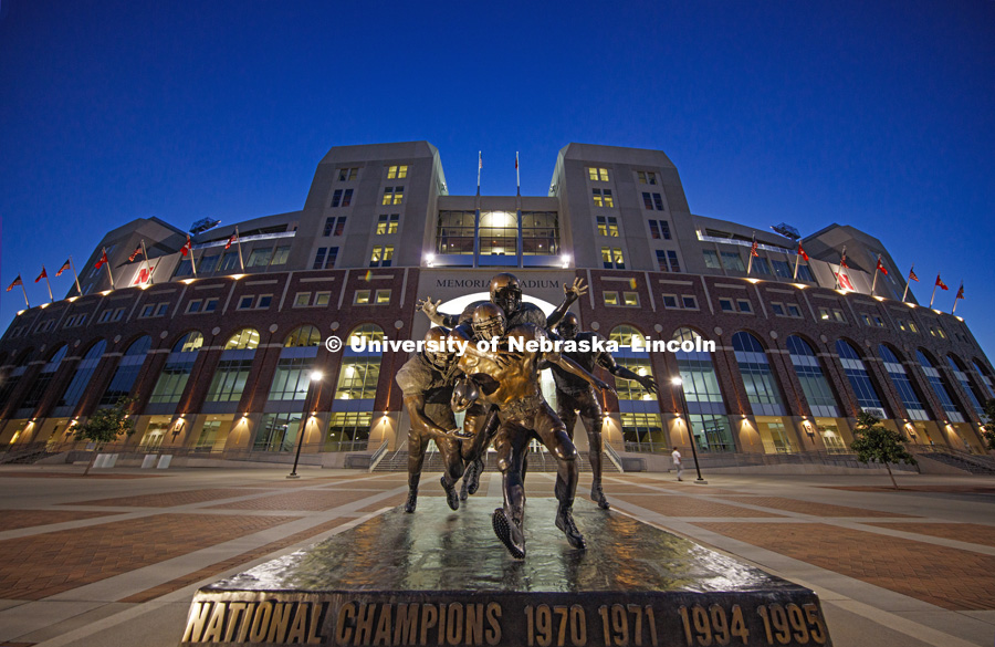Memorial Stadium with the sculpture The Legacy lit up for the night on City Campus. September 26, 2016. Photo by Craig Chandler / University Communication Photography.