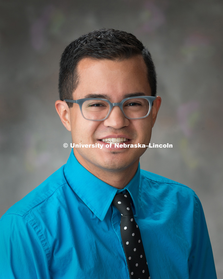 Studio portrait of Justin Gibson, Design Associate for Marketing and Communications, College of Arts and Science. September 28, 2016. Photo by Greg Nathan, University Communication Photography.