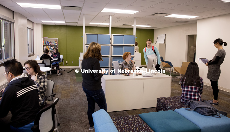 Amanda Love helps Jill Schindler with a question. Love works the reception desk to greet incoming students. English department Writing Center has been moved and remodeled in Andrews Hall. October 5, 2016. Photo by Craig Chandler / University Communication.