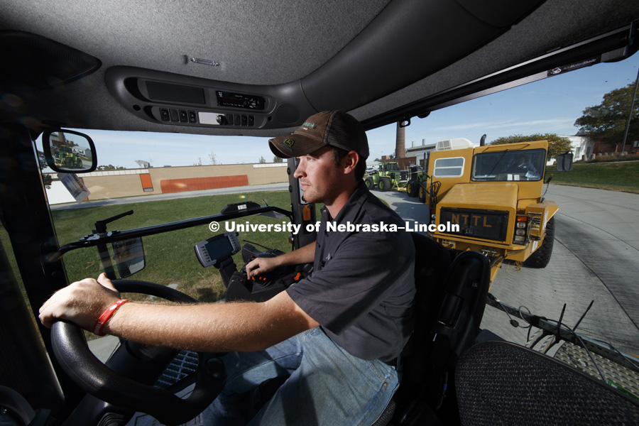 Cody Kneifl, senior in mechanical systems, sits in the cab of a Challenger tractor being tested by the tractor lab. The University of Nebraska Tractor Test Laboratory (NTTL) is the officially designated tractor testing station for the United States. October 27, 2016. Photo by Craig Chandler / University Communication Photography.