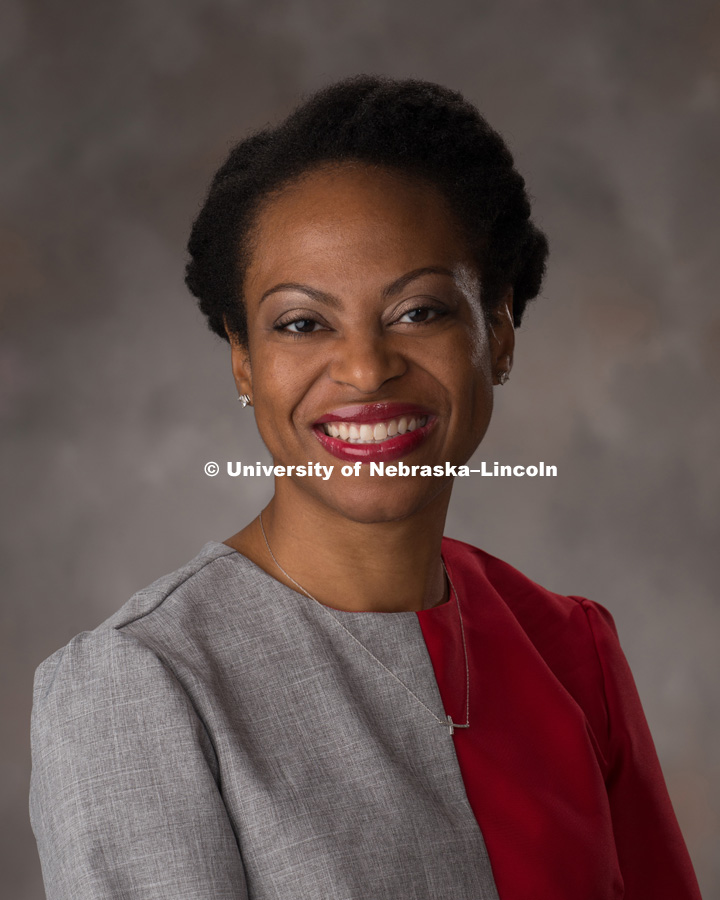 Studio portrait of CortneyJo Sandidge, Senior Associate Director for the Office of Scholarships and Financial Aid. October 28, 2016. Photo by Greg Nathan, University Communication Photography.