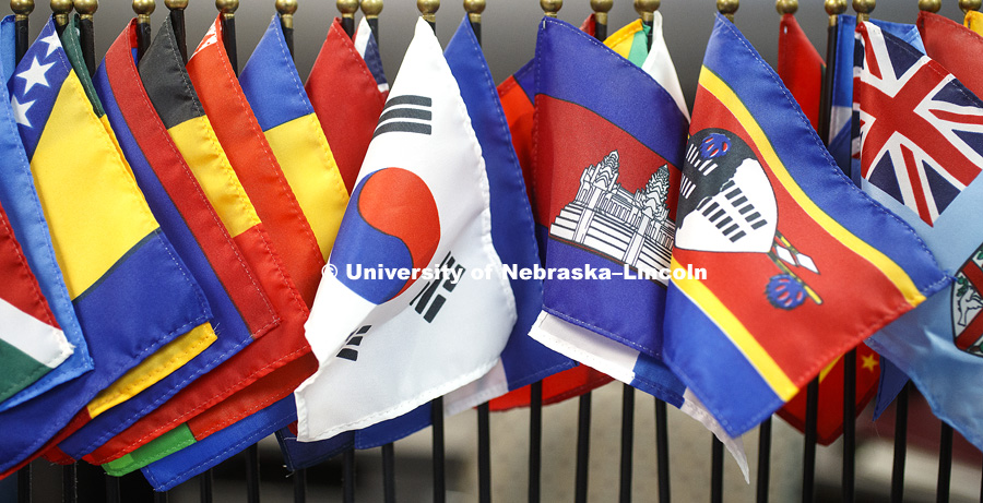 Flags of many countries adorn the office of Graduate Studies. Flags include South Korea, Cambodia, Swaziland and Fiji. January 6, 2017. Photo by Craig Chandler / University Communication.