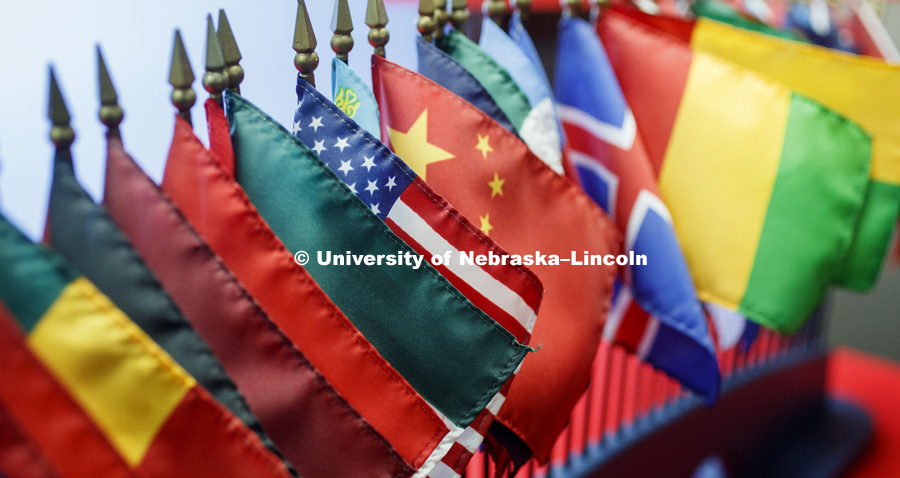 Flags of many countries adorn the office of Graduate Studies. Focus on United States flag. January 6, 2017. Photo by Craig Chandler / University Communication.