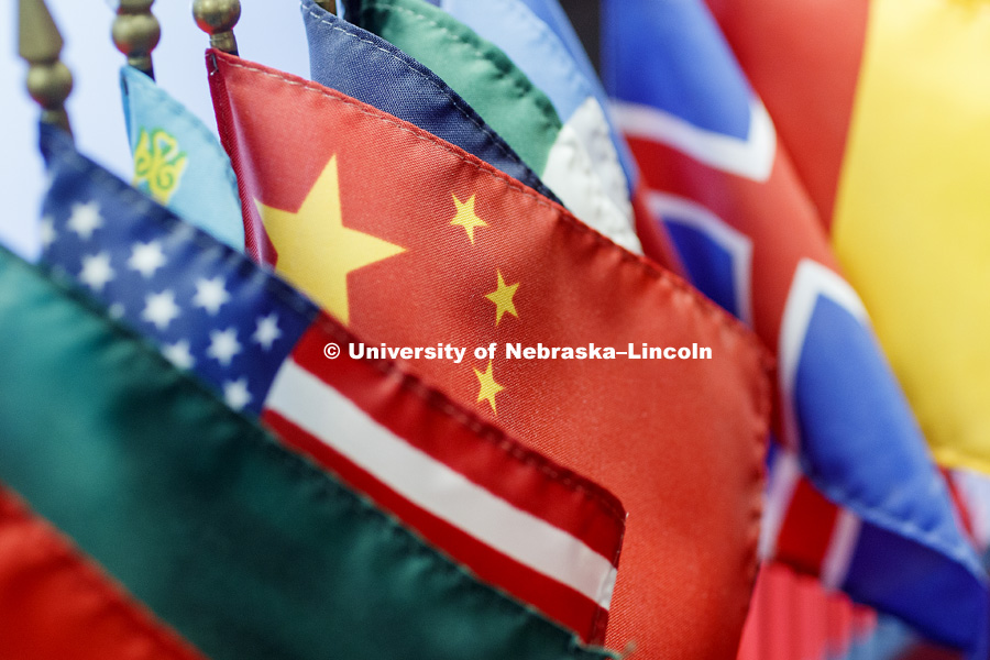 Flags of many countries adorn the office of Graduate Studies. Focus on China flag. January 6, 2017. Photo by Craig Chandler / University Communication.
