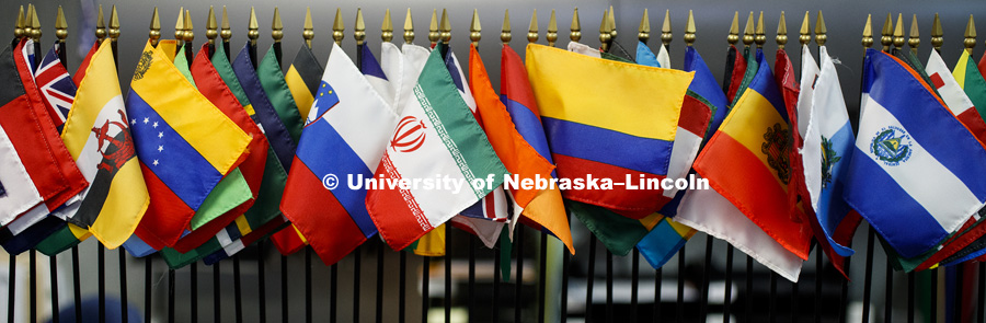 Flags of many countries adorn the office of Graduate Studies. Flags include Venezuela, Iran, Columbia and El Salvador. January 6, 2017. Photo by Craig Chandler / University Communication.