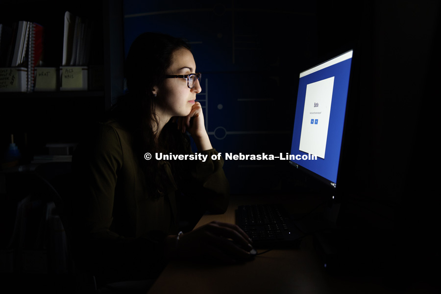 Jennie Laeng takes a computer survey as part of a concussion screening. CB3 Photo Shoot. May 3, 2017. Photo by Craig Chandler / University Communication.