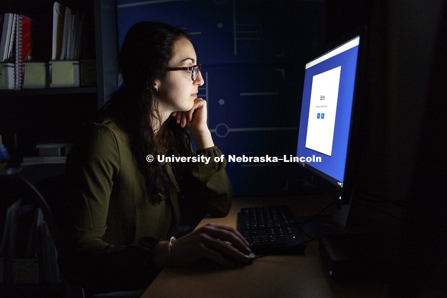 Jennie Laeng takes a computer survey as part of a concussion screening. CB3 Photo Shoot. May 3, 2017. Photo by Craig Chandler / University Communication.