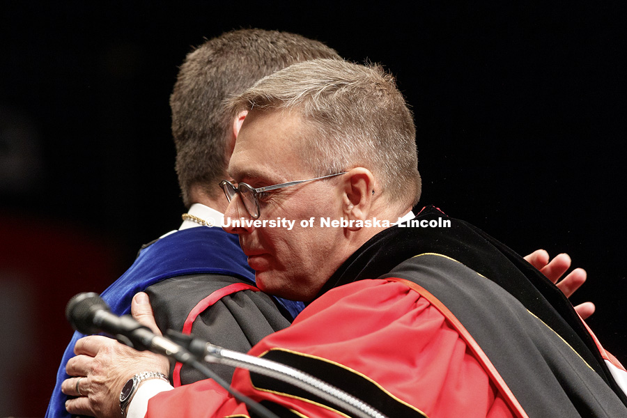 Chancellor Ronnie Green hugs University of Nebraska President Hank Bounds after being formally installed as chancellor. Installation Ceremony for Chancellor Ronnie Green. April 6, 2017. Photo by Craig Chandler / University Communication.