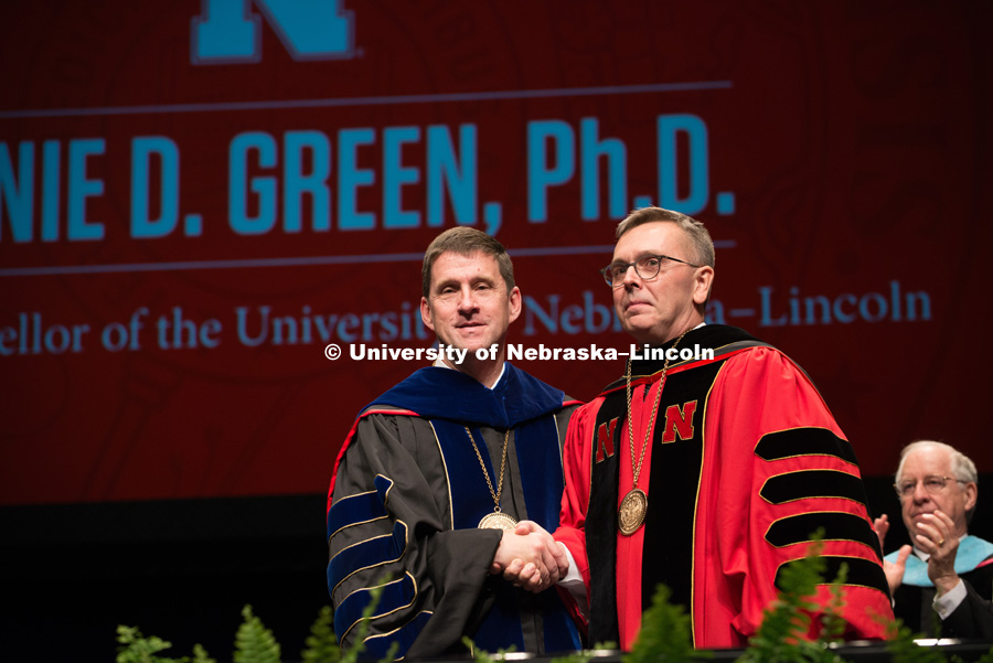 Chancellor Ronnie Green is congratulated by University of Nebraska President Hank Bounds after being formally installed as chancellor.  Installation Ceremony for Chancellor Ronnie Green. April 6, 2017. Photo by Greg Nathan University Communication