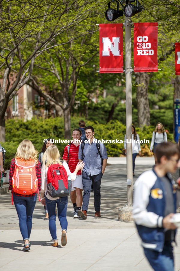 Students crossing campus. College of Business photo shoot. April 24, 2017. Photo by Craig Chandler / University Communication.