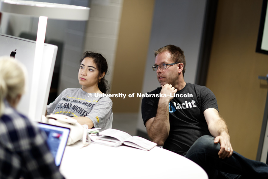 Alan Eno, Assistant Professor of Practice, works with Tryxcie Saavedra-Rodriguez on web projects in the new Social Hub in Andersen Hall basement. Final project presentations for advertising class. College of Journalism and Mass Communications. April 24,