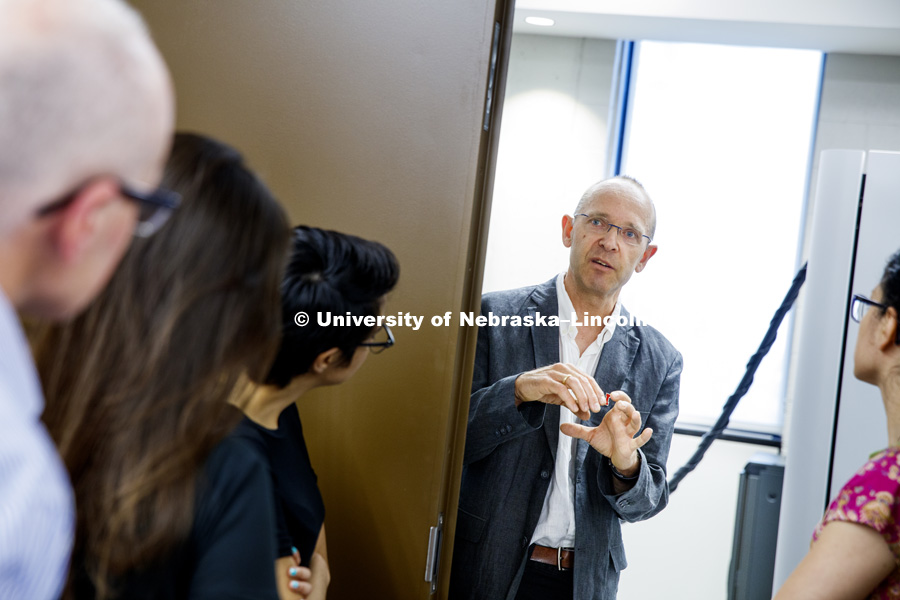 Professor Peter Sutter describes the new electronic microscope in one of the lab rooms during a tour of the new lab Tuesday. Professors Eli and Peter Sutter give remarks and tours at the opening of the FUNCTIONAL MATERIALS LABORATORY, 230-234 Scott