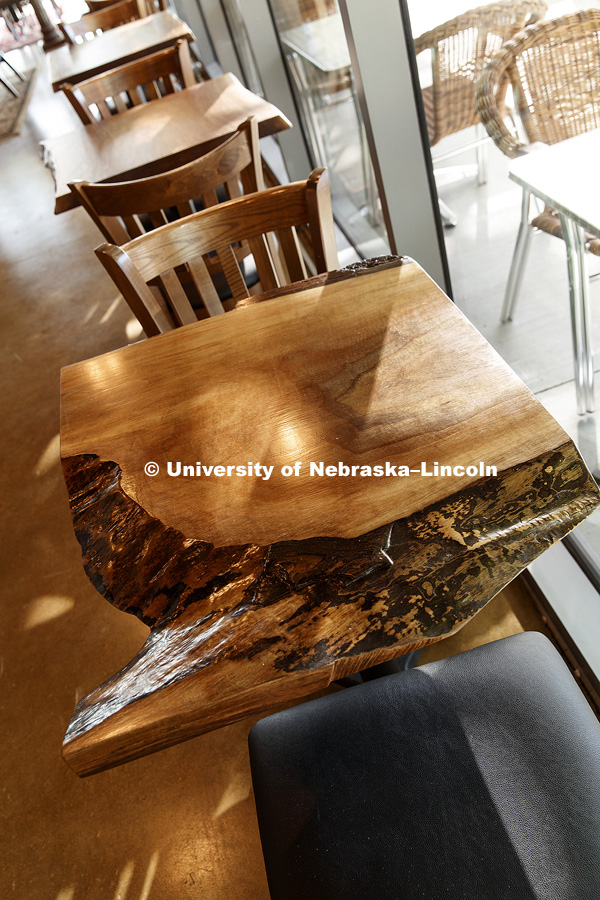 The tables in The Mill are made of Nebraska walnut. The Mill is a new coffee shop and restaurant opening at Nebraska Innovation Campus. They are also located in the Haymarket and south central Lincoln. June 7, 2017. Photo by Craig Chandler / University