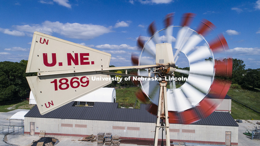 Windmill on east campus behind the Animal Science Building. At left is the new Veterinary Diagnostic Center. June 27, 2017. Photo by Craig Chandler / University Communication.