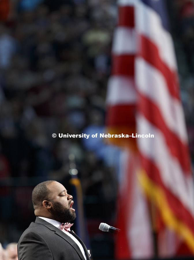 Alfonzo Cooper, Jr., Doctoral of Musical Arts student, sings the National Anthem to begin the August Commencement at Pinnacle Bank Arena. August 12, 2017. Photo by Craig Chandler / University Communication.