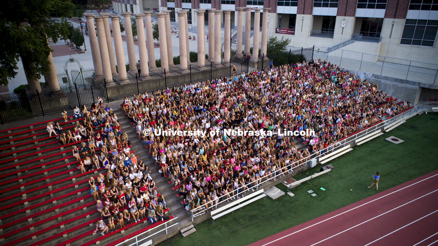 Sorority Recruitment first night. Information meeting and 1,060 freshmen meeting their recruitment guides in front of East Stadium. August 13, 2017. Photo by Craig Chandler / University Communication.