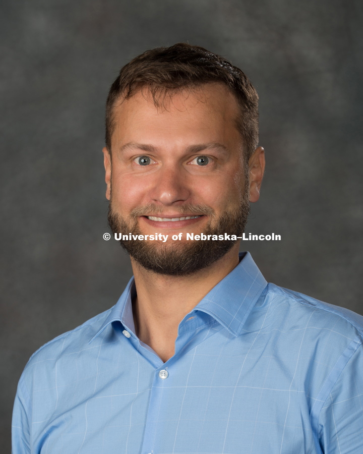 Studio portrait of Frank Golf, Assistant Professor, Physics and Astronomy. New Faculty Orientation. August 16, 2017. Photo by Greg Nathan, University Communication Photography.