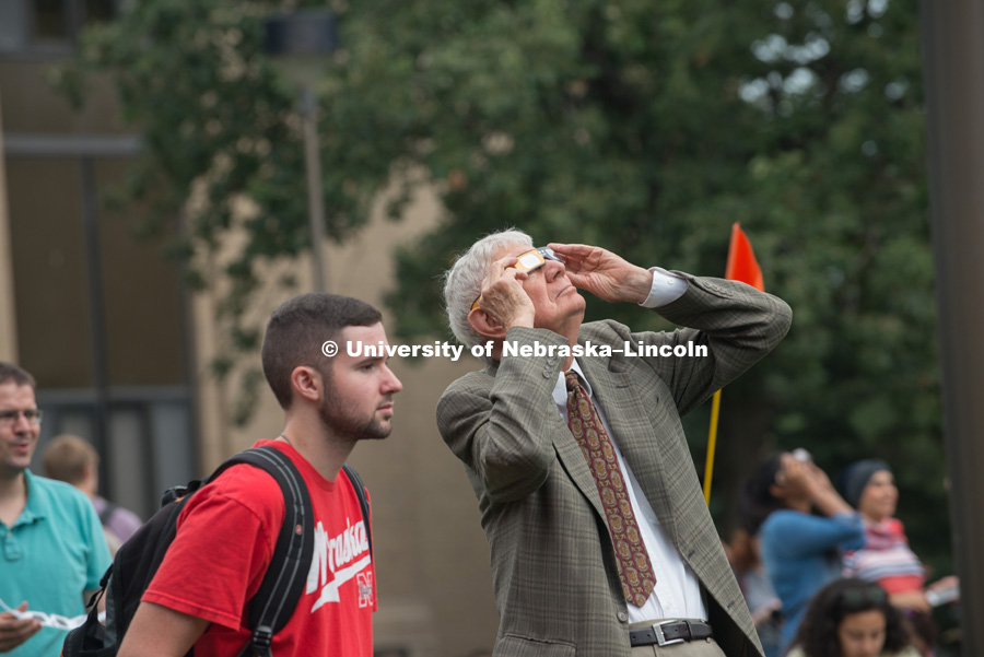 Former chancellor, Martin A. Massengale views the eclipse with east campus students, faculty and staff at the University of Nebraska-Lincoln. August 21, 2017. Photo by Greg Nathan, University Communication Photography.