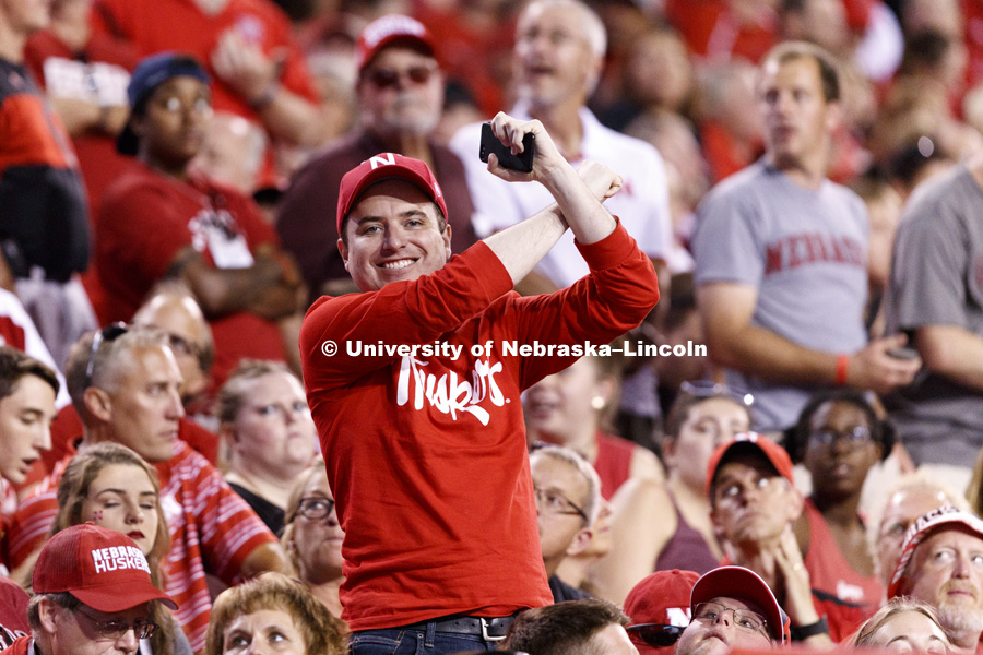 A fan throws the bones. Nebraska football v. Arkansas State. September 2, 2017. Photo by Craig Chandler / University Communications