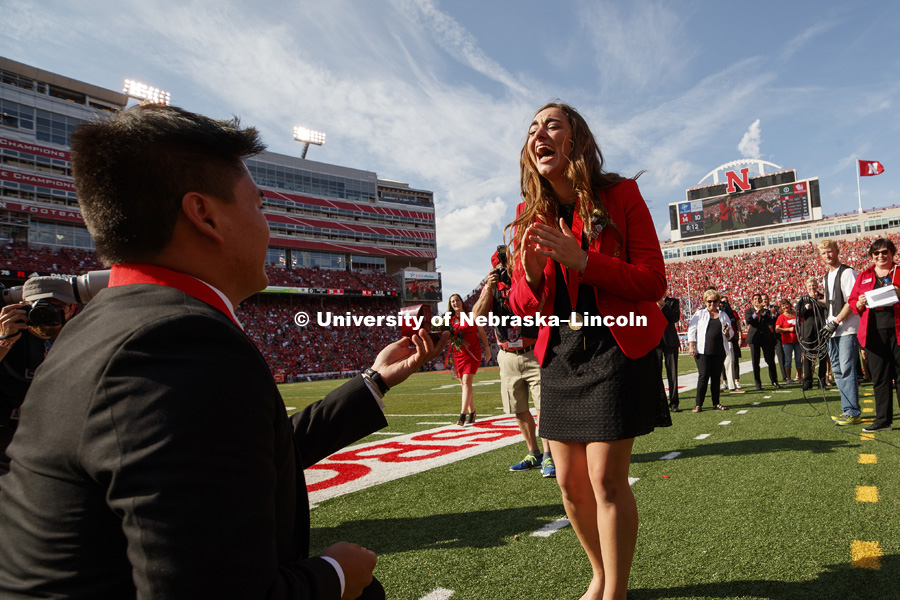 It was a memorable day for University of Nebraska-Lincoln seniors Shayne Arriola and Laura Springer, both of Grand Island. First, they became homecoming king and queen; then they became fiancé and fiancée. After being crowned on the field at Memorial