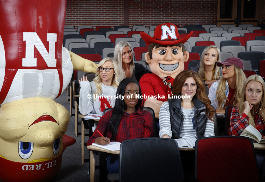 Herbie Husker, the Cheer Squad and Little Red in a classroom for alumni magazine shoot. October 27, 2017. Photo by Craig Chandler / University Communication.