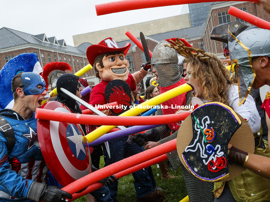 Herbie Husker joins the University of Nebraska–Lincoln’s Department of Classics and Religious Studies in their annual battle using pool noodles. This year they reenacted the battle of Troy. October 31, 2017. Photo by Craig Chandler / University