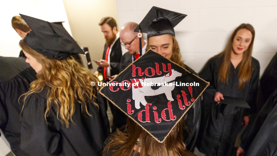 Aliesha Dethlefs mortar board shows her pride in CASNR. Undergraduate Commencement at Pinnacle Bank Arena. December 16, 2017. Photo by Craig Chandler / University Communication.