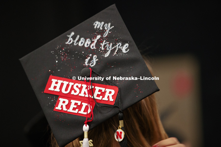 "My blood type is Husker Red" mortar board. Undergraduate Commencement at Pinnacle Bank Arena. December 16, 2017. Photo by Craig Chandler / University Communication.