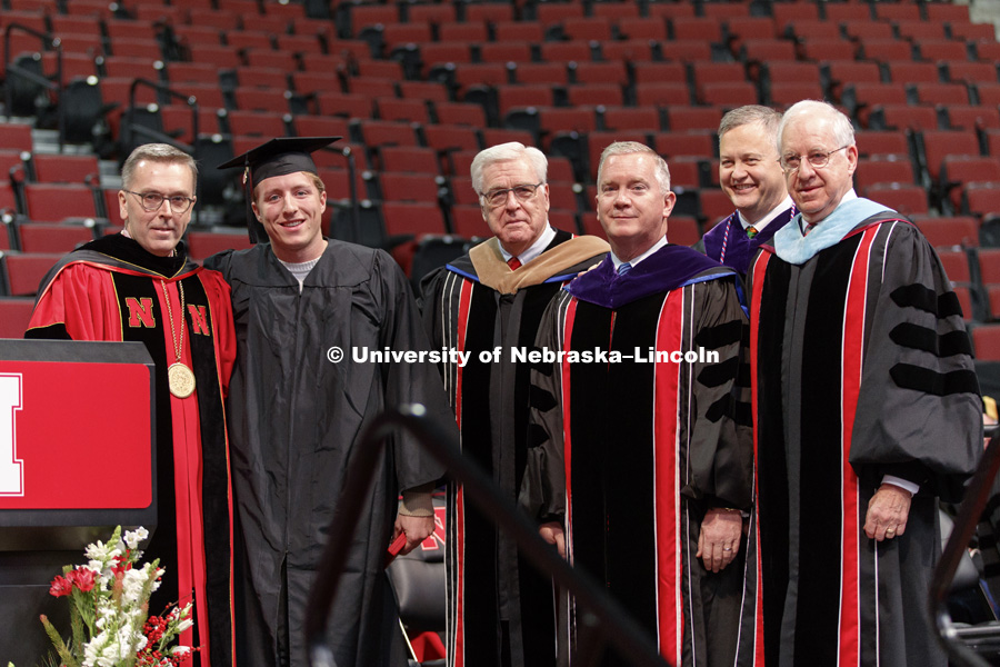 James B. Milliken, former president of the University of Nebraska system and chancellor of The City University of New York was awarded Nebraska's prestigious Cather Medal Saturday. Chancellor Ronnie Green presents the medal to Caleb Milliken, his son, who