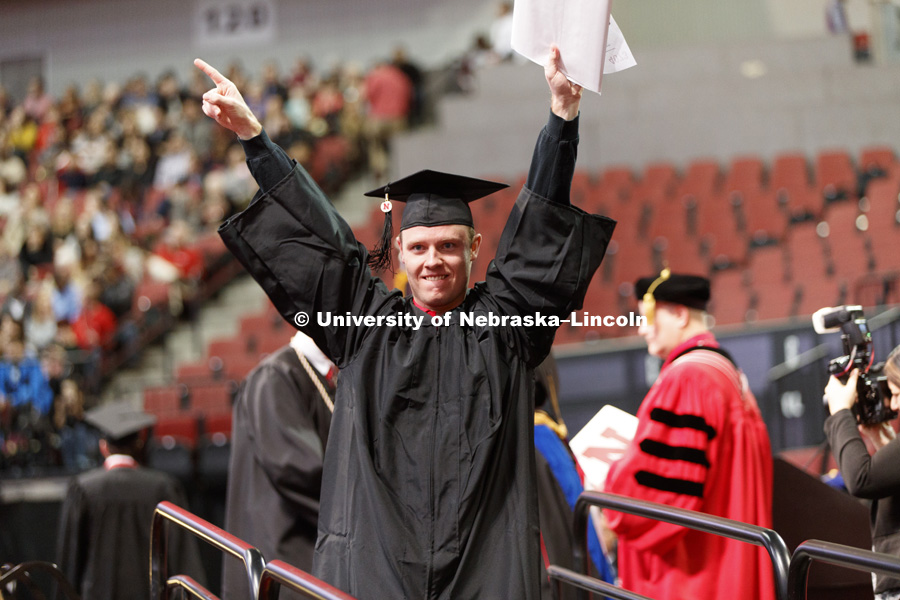 Christopher Hudek celebrates his College of Business degree. Undergraduate Commencement at Pinnacle Bank Arena. December 16, 2017. Photo by Craig Chandler / University Communication.